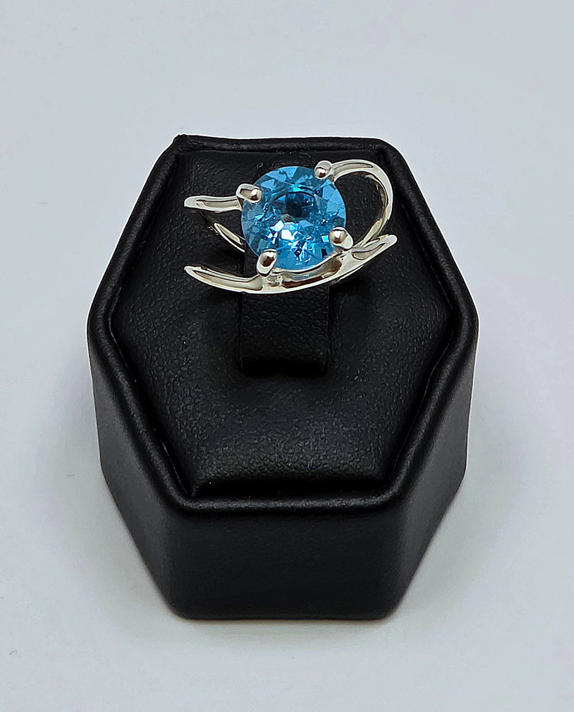 Sterling Silver Swirl Blue Topaz Solitaire Ring