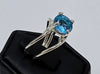 Sterling Silver Swirl Blue Topaz Solitaire Ring