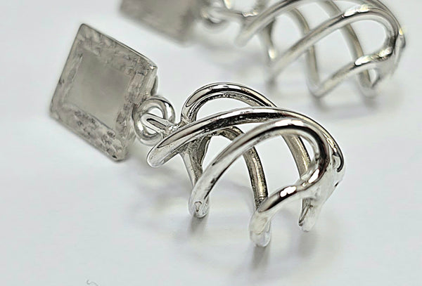 Small twirled Earrings