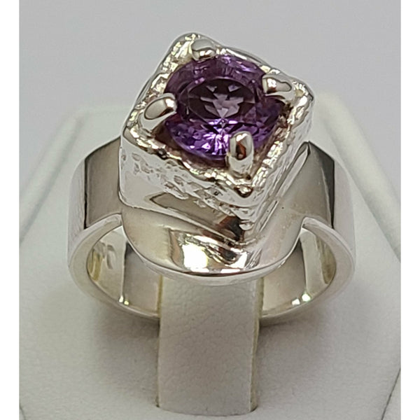 Circular Amethyst embedded in Sterling Silver Ring