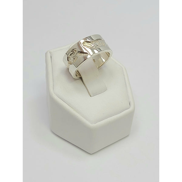 High polish mildly textured Ring