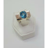 Blue Topaz sitting on high polish Ring