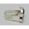 Triangular Amethyst and round Peridot Ring