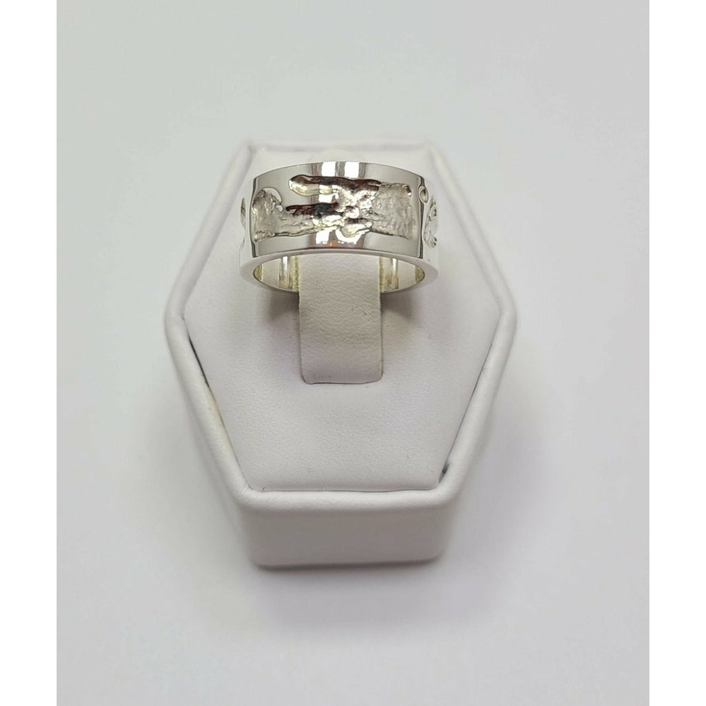 High polish mildly textured Ring
