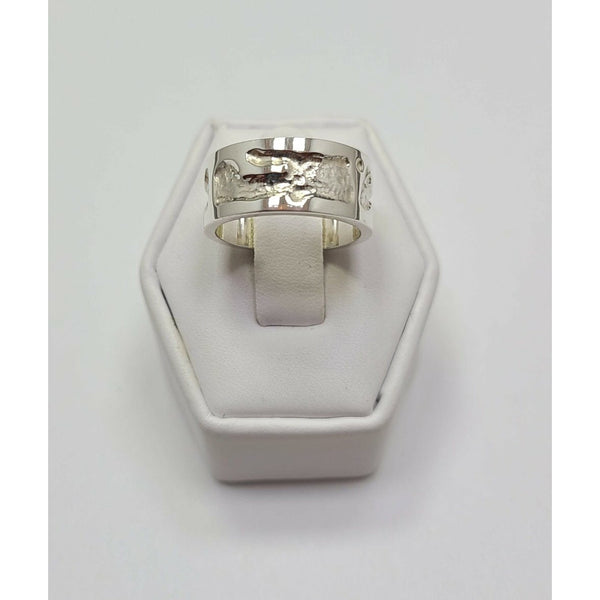 High polish mildly textured Ring