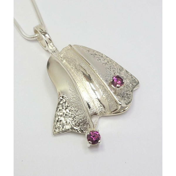 Winged Pink Topaz Pendant